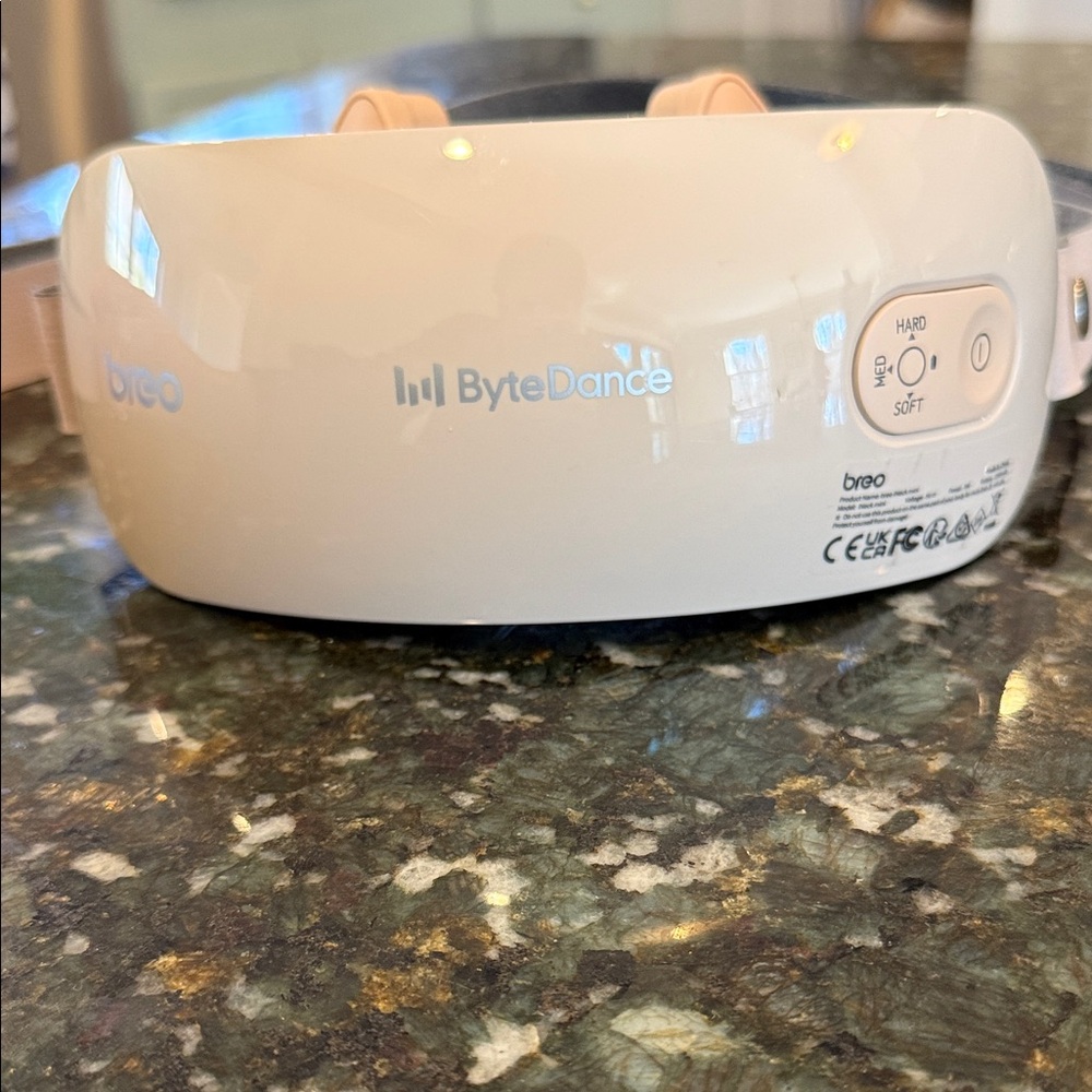 Breo neck massager